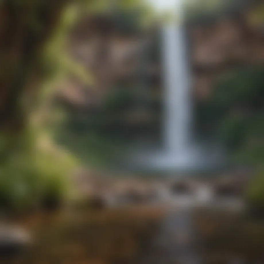 A breathtaking view of a cascading waterfall surrounded by lush greenery in Utah.